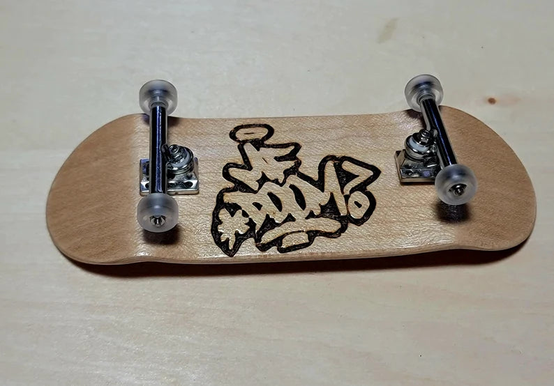 MF Doom Fingerboard: Wood Engraved Fingerboard (skateboard) & Suitcase Bag and Accessory (different colors) - Too Good Engravings